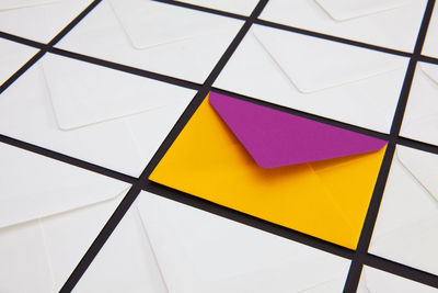 High angle view of multi colored umbrella on tiled floor