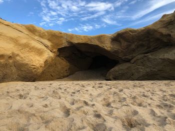 Rock formations in desert against sky