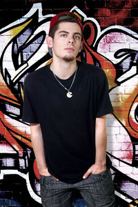 Portrait of young man standing outdoors