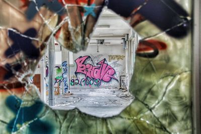 Close-up of text on glass