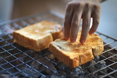 Close-up of person preparing food