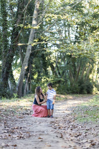 Couple sitting on land