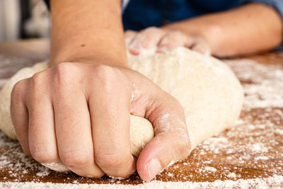 Close-up of person preparing food