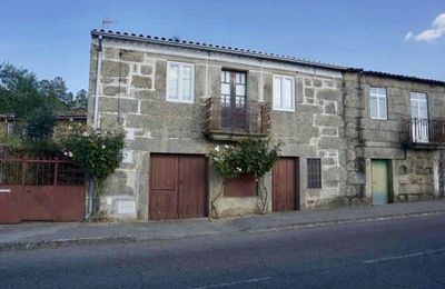 Exterior of old building by road