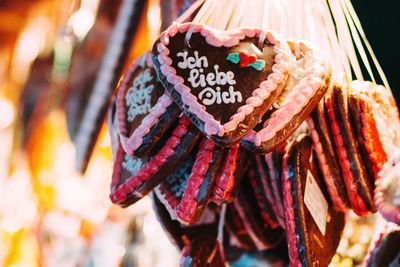 Close-up of multi colored decorations hanging at market