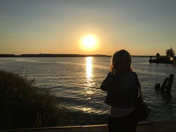 Scenic view of sea at sunset