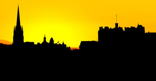 Silhouette of statue at sunset
