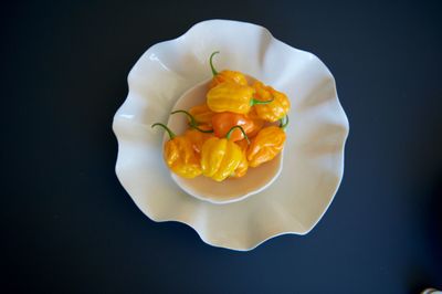 Directly above shot of habaneros in white plate