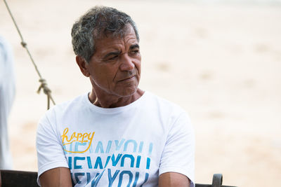 Mid adult man on beach