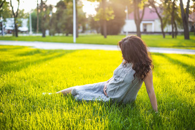 Rear view of woman on land