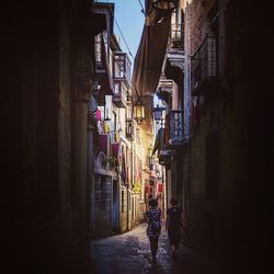 Narrow alley along buildings