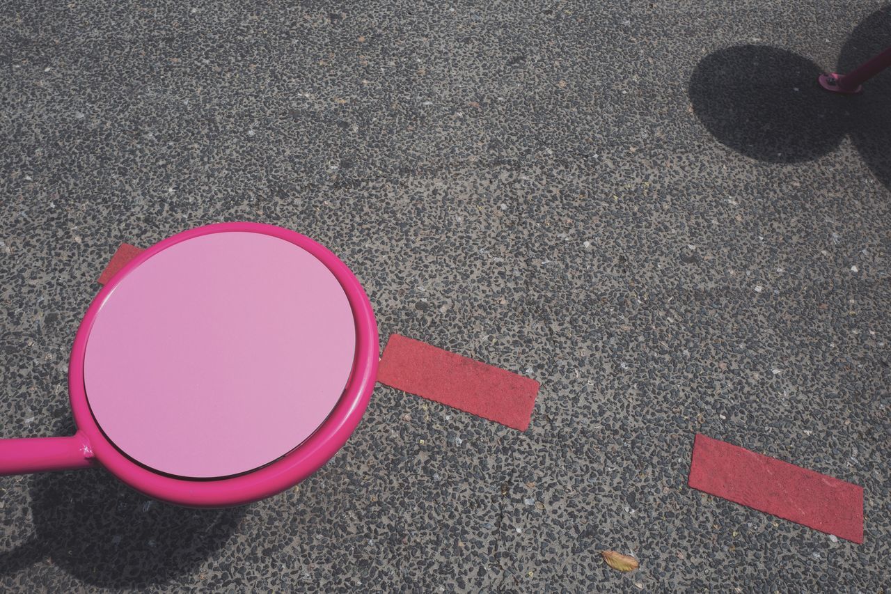 road, street, city, transportation, pink color, sign, day, red, high angle view, symbol, asphalt, no people, outdoors, low section, marking, shape, road marking, geometric shape, circle, sport