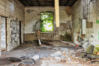 Damaged window in abandoned building