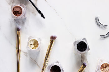 High angle view of beauty products on white table