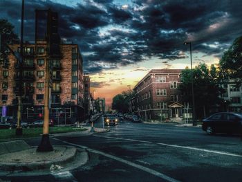 City street against cloudy sky