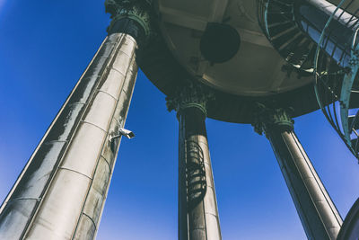 Low angle view of built structure against blue sky