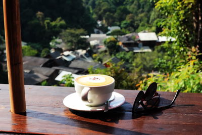 Close-up of coffee cup on table