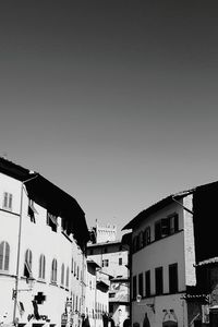 Low angle view of buildings against clear sky