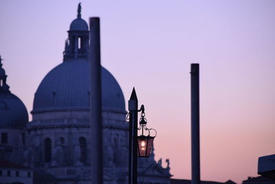 Silhouette of temple against sky during sunset