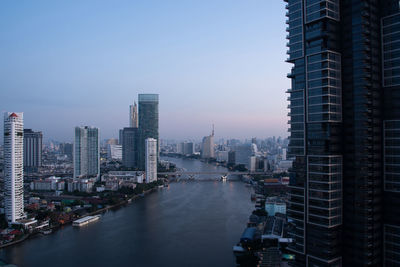 Modern buildings in city against sky