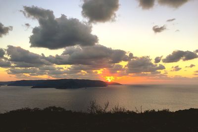 Scenic view of landscape against sky during sunset