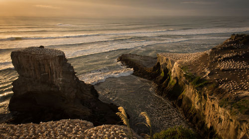 Scenic view of sea against sky during sunset