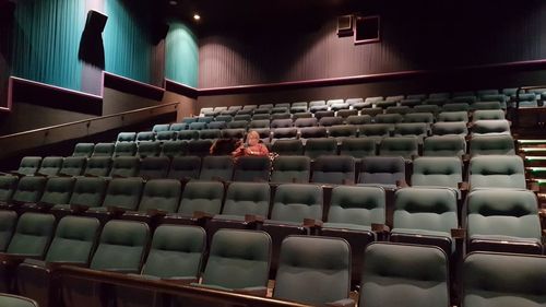 Empty chairs in stadium