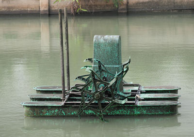 Boat moored in lake