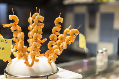 Close-up of shrimps in skewer at store