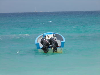 Full length of woman swimming in sea