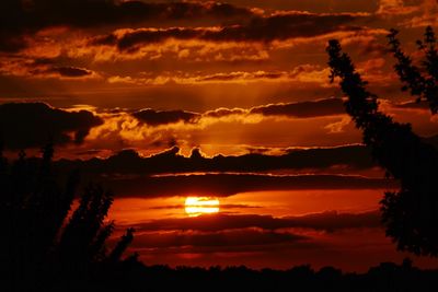 Scenic view of dramatic sky during sunset