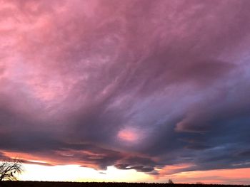 Low angle view of dramatic sky during sunset