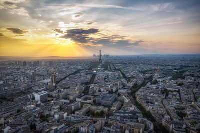 Paris city panoramic sunset view with eiffle tower in the distance. famous view