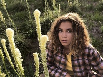 Portrait of beautiful young woman in sunlight