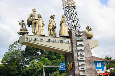 Low angle view of statue against building