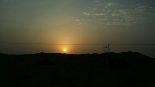 Scenic view of sunset over landscape