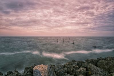 Scenic view of sea against sky during sunset