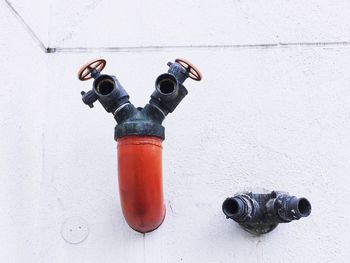 Close-up of fire hydrant on wall