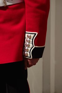 Midsection of british royal guard in uniform