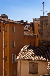 Low angle view of buildings against clear sky