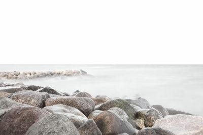 Scenic view of sea against clear sky