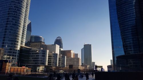 Low angle view of skyscrapers against sky