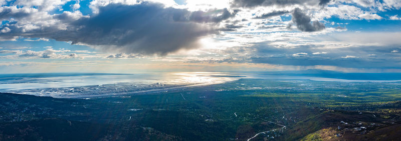 Aerial view of dramatic landscape against sky