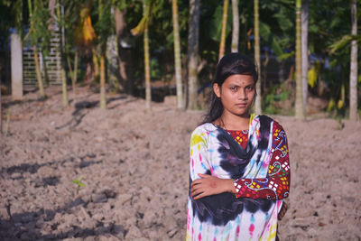 Portrait of teenage girl in forest