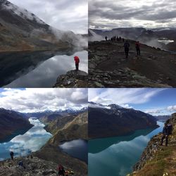 People on snowcapped mountains by lake against sky