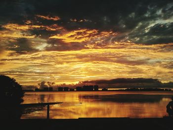 Scenic view of landscape against cloudy sky