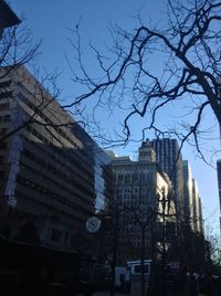 Low angle view of buildings against clear sky