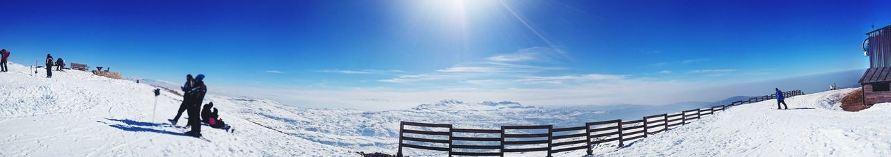 People on snow covered mountain