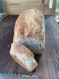 High angle view of bread on cutting board