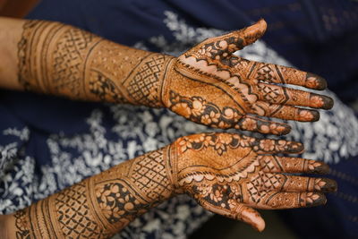 Henna stained hands on henna night